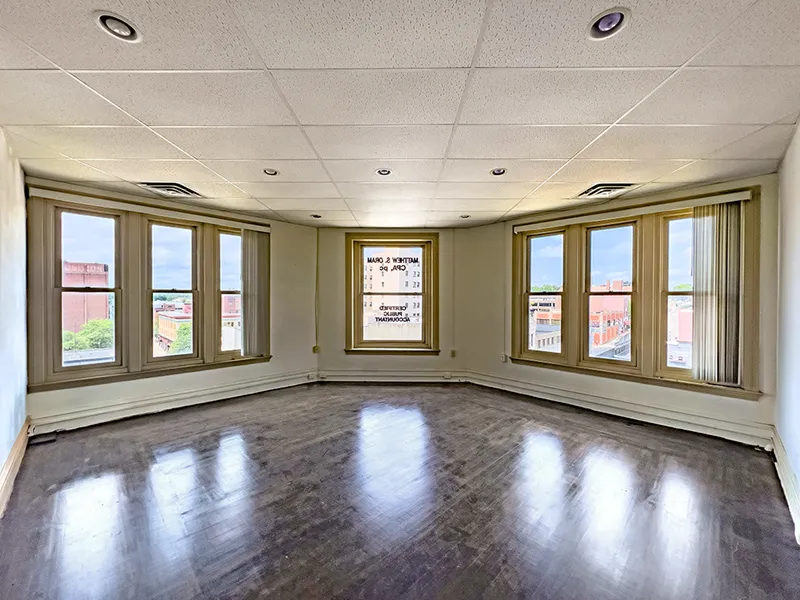 Office interior with wall of windows